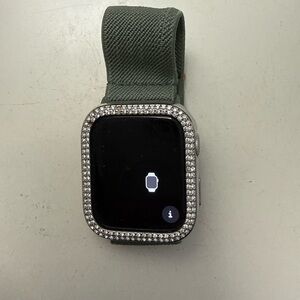 Apple Smartwatch with Dark Green Strap and Silver Bezel